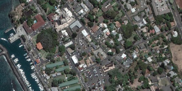 SATELLITE IMAGES CAPTURE WILDFIRE DEVASTATION IN LAHAINA