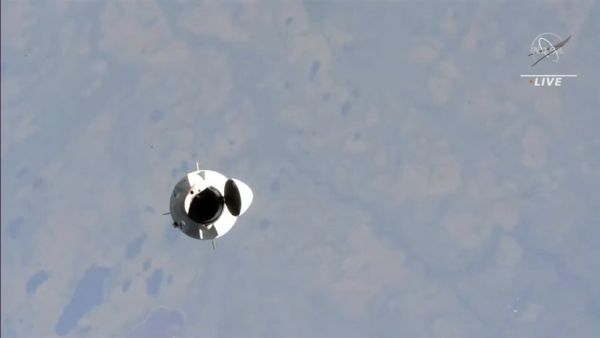 SPACEX CREW-7 DRAGON CAPSULE DOCKS AT SPACE STATION WITH INTERNATIONAL ASTRONAUT TEAM