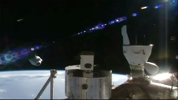 AX-3 ASTRONAUTS UNDOCK IN DRAGON FROM STATION FOR EARTH RETURN