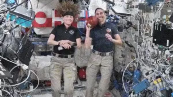 IT'S GOOD! SPACE STATION ASTRONAUTS TOSS FOOTBALL IN ZERO-G FOR SUPER BOWL 2024