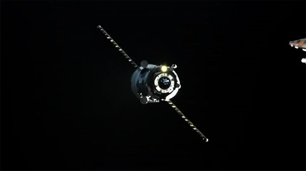 RESUPPLY SHIP DOCKS TO STATION COMPLETING SPACE DELIVERY